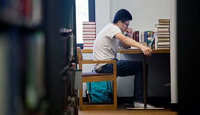 student at study carrel